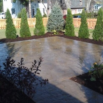 Hackmann Lawn & Landscape - a backyard with a concrete patio - Snow Removal Near Me - Saint Charles, Missouri Hackmann Lawn & Landscape - a backyard with a concrete patio - Snow Removal Near Me - Saint Charles, Missouri