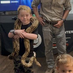 Reptile Den - my son holding hos first boa!!!
