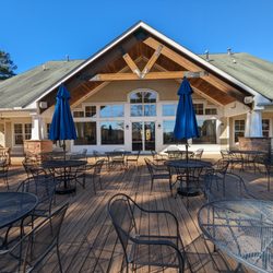 The Preserve At Jordan Lake Golf Club - Outside the clubhouse. Back. Patio.