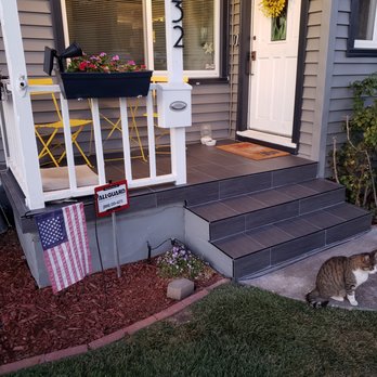 Peraza Construction - a cat on the front steps of a house - General Contractors Near Me - American Canyon, California