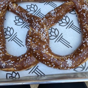 Torch & Crown Brewing - a pretzel on a tray - Beer Gardens Near Me - New York, New York Torch & Crown Brewing - a pretzel on a tray - Beer Gardens Near Me - New York, New York