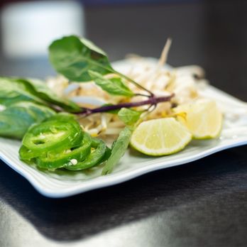 Rolls And Grill - a plate of food on a table - Vietnamese Near Me - Bakersfield, California
