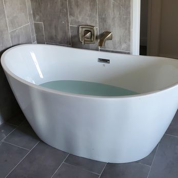 Danish Plumbing - a bathtub in a bathroom - Plumbing Near Me Danish Plumbing - a bathtub in a bathroom - Plumbing Near Me