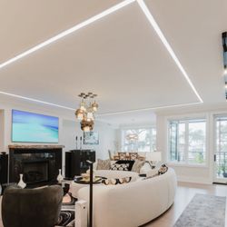 CAV Integrated Home - Client home, lighting design with track, linear lighting track, and limited recessed lighting.