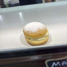 Vanilla cream filled donut Vanilla cream filled donut