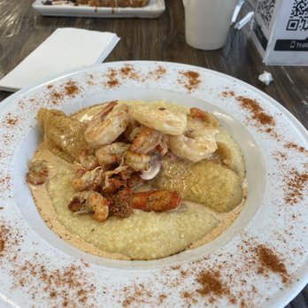 KitchenCray Cafe - Catfish, shrimp, crawfish, fried lobster, cream sauce over grits. - Breakfast & Brunch Near Me - Lanham, Maryland