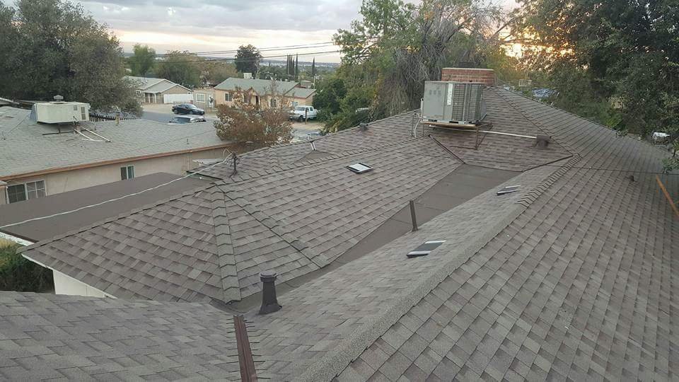 Slide of Green's Roofing