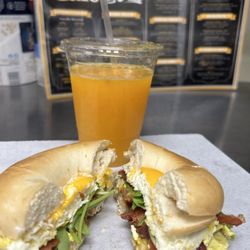 Cafe Plus - Fresh squeezed orange juice and a fresh made breakfast sandwich.