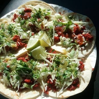 Tacos Sanchez - a tortilla topped with lettuce, tomatoes, and cheese - Food Trucks Near Me - Wapato, Washington Tacos Sanchez - a tortilla topped with lettuce, tomatoes, and cheese - Food Trucks Near Me - Wapato, Washington