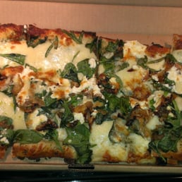 Medium Popeye pizza $10. Excellent, although a bit greasy, likely because of the pesto.