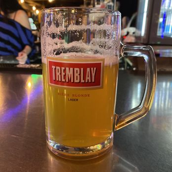 Piranha Bar - a pint of beer on a table - Bars Near Me - Montreal, Quebec