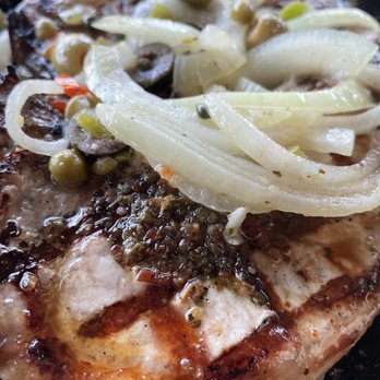 Port Barna - Pork chop and a sizzling plate - Mediterranean Near Me - Jensen Beach, Florida Port Barna - Pork chop and a sizzling plate - Mediterranean Near Me - Jensen Beach, Florida