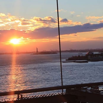 Brooklyn Bridge - Sun getting ready to set. Statue of Liberty in the distance - Landmarks & Historical Buildings Near Me - Brooklyn, New York Brooklyn Bridge - Sun getting ready to set. Statue of Liberty in the distance - Landmarks & Historical Buildings Near Me - Brooklyn, New York