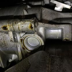 Maximum Auto Outlet - Massive oil leaks and antifreeze leaks that Maximum Auto Outlet knew about and steam cleaned to present the car for sale.