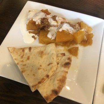 Maiwand Grill - Pumpkin Kadu Pan-fried then baked baby pumpkin, seasoned with sugar, served with yogurt and topped with ground beef sauce. - Afghan Near Me - Baltimore, Maryland Maiwand Grill - Pumpkin Kadu Pan-fried then baked baby pumpkin, seasoned with sugar, served with yogurt and topped with ground beef sauce. - Afghan Near Me - Baltimore, Maryland