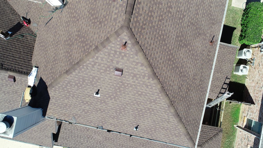 Slide of Qualitas Roofing and Construction