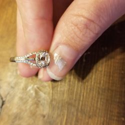 LeDor Jewelry - Ring After, Clear Gap between Center & Surrounding Stones.