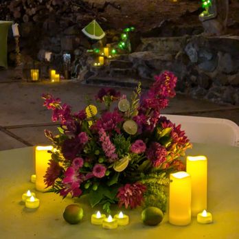 Crystal Gardens Florist - Purple and green floral centerpiece with limes and candles outside - Florists Near Me - Poway, California Crystal Gardens Florist - Purple and green floral centerpiece with limes and candles outside - Florists Near Me - Poway, California