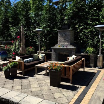 Greenland Landscape - a patio with a fireplace and seating area - Landscape Architects or Designers Near Me - Hackensack, New Jersey Greenland Landscape - a patio with a fireplace and seating area - Landscape Architects or Designers Near Me - Hackensack, New Jersey