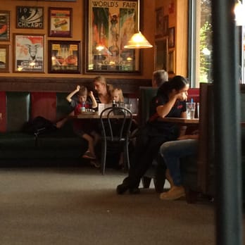 Giordano's - Waitress sitting with who knows. - Pizza Near Me - Morton Grove, Illinois Giordano's - Waitress sitting with who knows. - Pizza Near Me - Morton Grove, Illinois