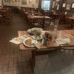 Cracker Barrel Old Country Store - Uncleaned tables that were left for over an hour.