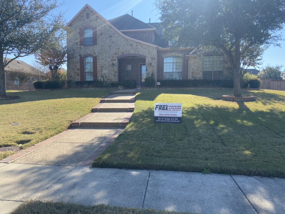 Slide of Freedom Roofing & Construction