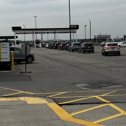 Hertz Rent A Car - Extremely long exit line with only lane open.