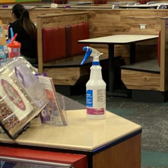 Chuck E. Cheese - Spray bottle left on the counter within reach of children. - Pizza Near Me - Placentia, California