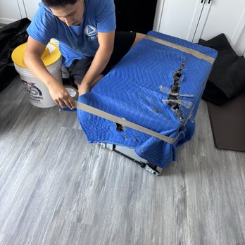 U Relax DMV Movers - Wrapping a furniture piece - Movers Near Me - Arnold, Maryland U Relax DMV Movers - Wrapping a furniture piece - Movers Near Me - Arnold, Maryland