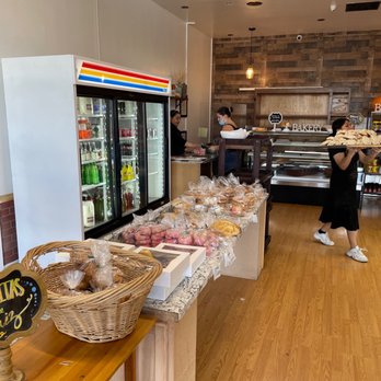 Beto's Bakery - a woman carrying a tray of food - Bakeries Near Me - Ceres, California