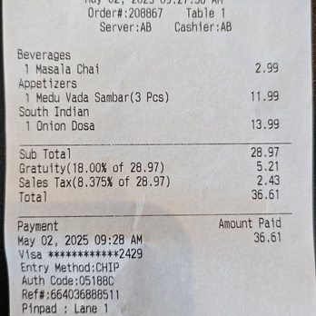Divine Dosa & Biryani - Gratuity for a group of 1? $37 for Dosa, Wada, and Chai. Dosa was okay. Wada was bad. No peanut chutney. Wouldn't go there again. - Indian Near Me - Las Vegas, Nevada