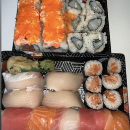 Rainbow Roll, Yellowtail Nigiri, Salmon Roll, Calamari Roll, can't remember the name of the upper left roll. Rainbow Roll, Yellowtail Nigiri, Salmon Roll, Calamari Roll, can't remember the name of the upper left roll.