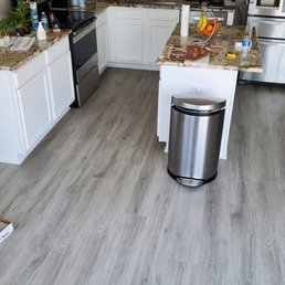 a kitchen with white cabinets a kitchen with white cabinets