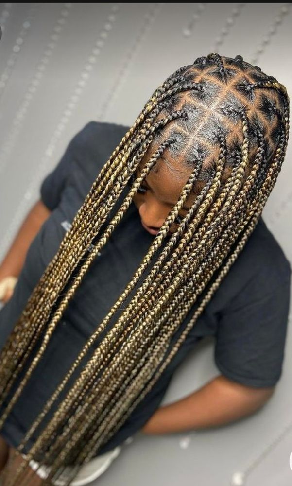Shelynda African Hair Braiding Logo