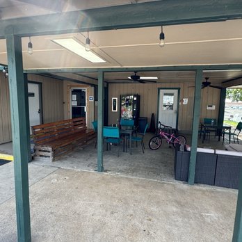 Belton RV Park - I call this the gathering area, where guests hang out regularly, and even BBQ together on weekends. - Campgrounds Near Me - Belton, Texas