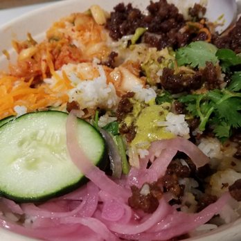 JoJu - Carmelized meat and overflow of rice underneath - Sandwiches Near Me - New York, New York