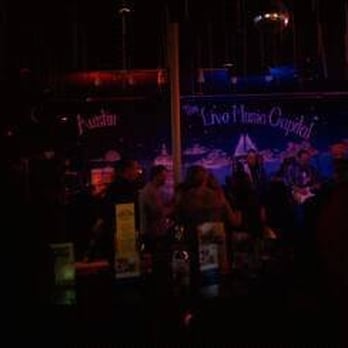 Anderson Mill Pub - a crowd of people at a bar - Dive Bars Near Me - Austin, Texas