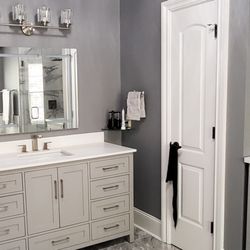 ProLux Remodeling - New vanity, lights, lighted medicine cabinet.