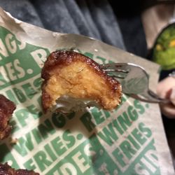 Wingstop - Dry chicken.