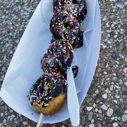 Donutz On A Stick Ice Cream and Grill - Large donutz on a stick. Chocolate frosting and sprinkles