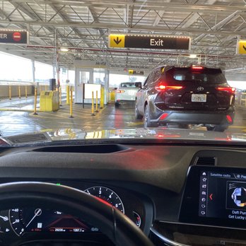 Hertz Rent A Car - Second line to exit the garage. Chalk up another 30 minutes. - Car Rental Near Me - Richmond, Virginia