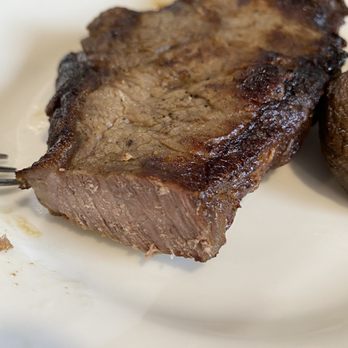 Uncle Bill's Diner - a piece of steak on a plate - Diners Near Me - Flushing, New York