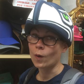 The Hat Shop - Me contemplating getting a Seahawks hat. - Accessories Near Me - Leavenworth, Washington