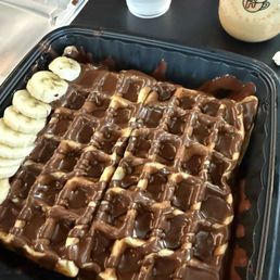 Waffle with dark chocolate and banana Waffle with dark chocolate and banana
