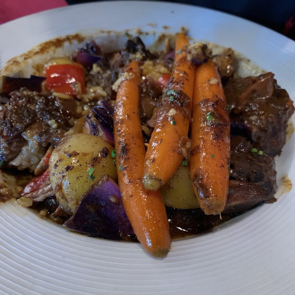 Sisserou's Caribbean Restaurant & Catering - Stewed Oxtail - Caribbean Near Me - Tulsa, Oklahoma Sisserou's Caribbean Restaurant & Catering - Stewed Oxtail - Caribbean Near Me - Tulsa, Oklahoma