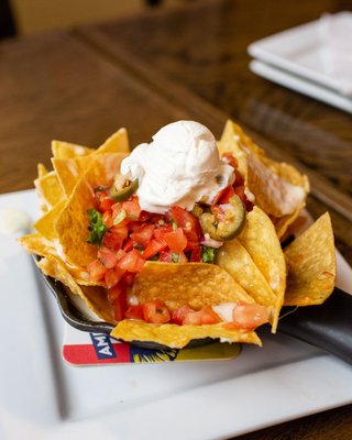 Photo of New England's Tap House Grille - Hooksett, NH, US. Tap House Nachos