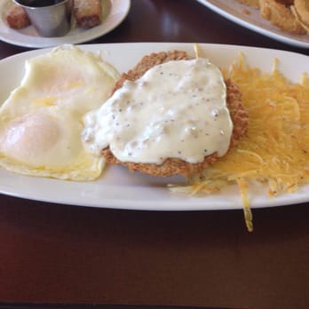The Eatery - Eggs over easy, were more sunny side up too raw for me. Chicken fried steak yummy! And hash browns - American Near Me - Lincoln, Nebraska