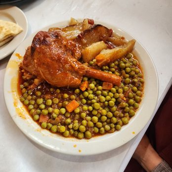 Pegasus Taverna - St Clair Shores - Lamb shank, potatoes, peas - Greek Near Me - St. Clair Shores, Michigan Pegasus Taverna - St Clair Shores - Lamb shank, potatoes, peas - Greek Near Me - St. Clair Shores, Michigan