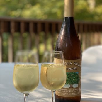 Pomona Winery - two glasses of wine and a bottle of wine - Wineries Near Me - Pomona, Illinois Pomona Winery - two glasses of wine and a bottle of wine - Wineries Near Me - Pomona, Illinois