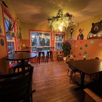Old Abe Coffee - tables and chairs in a brightly lit room - Coffee & Tea Near Me - Rochester, Minnesota